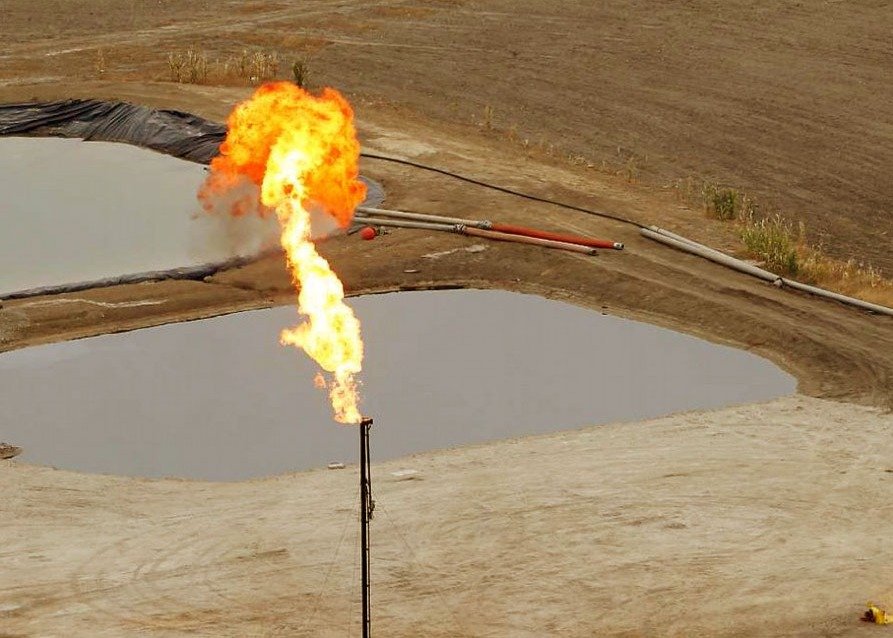 Oil and Gas Produced Water Holding Ponds with Flare Gas flaring